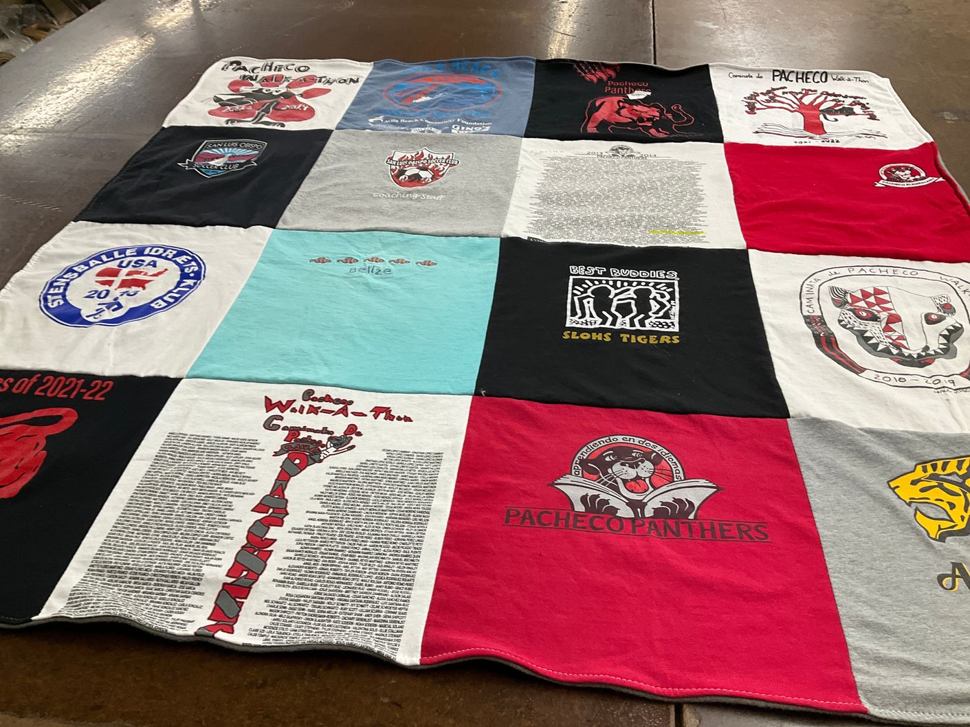 T-shirt quilt featuring pacheco panthers, slow high school tigers by Carolyn from CA