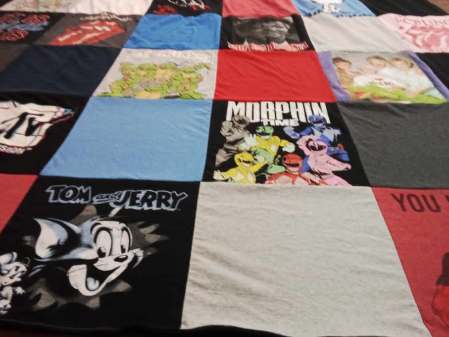 T-shirt quilt with cartoons, pop culture themes by T. from MO