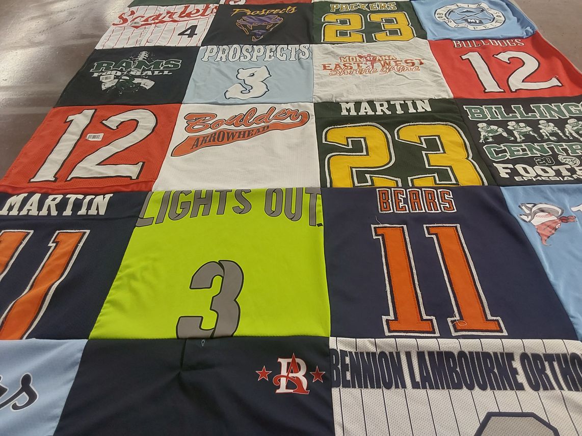 T-shirt quilt featuring boulder arrowhead, billings central football by Tricia from MT