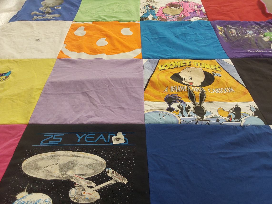 T-shirt quilt with cartoons, animation themes by Shari from WA