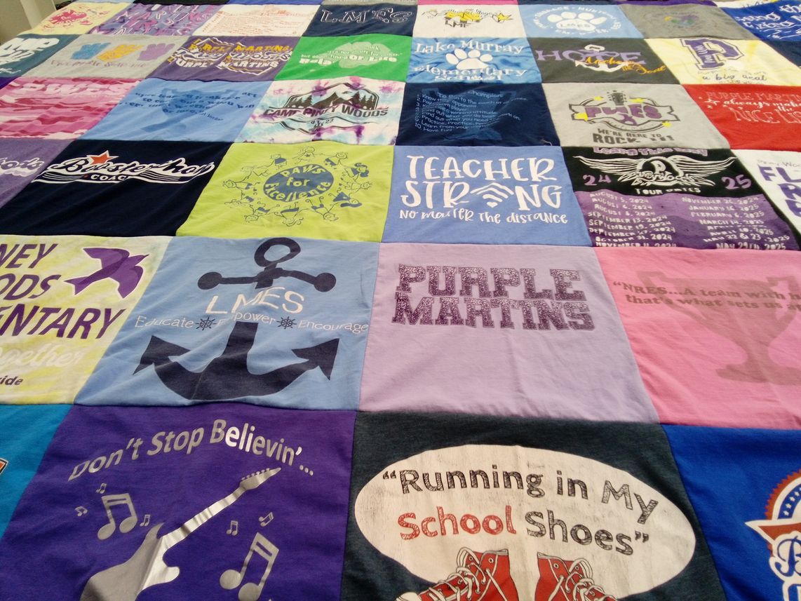 T-shirt quilt featuring purple martins by Lauren from SC
