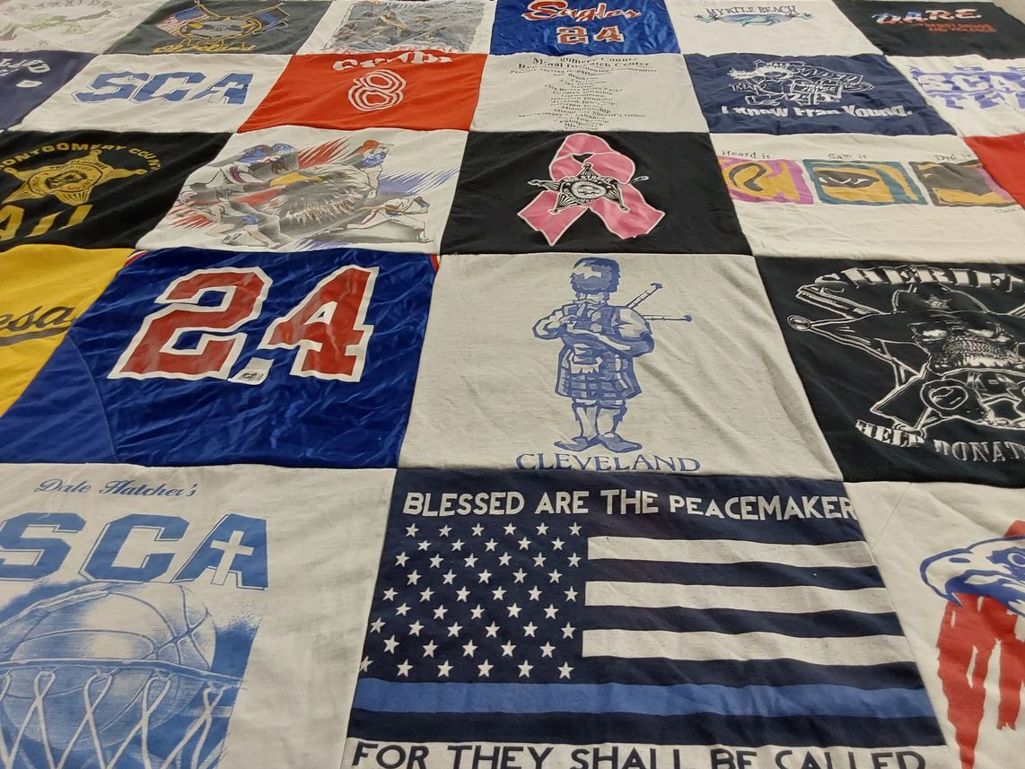 T-shirt quilt with basketball, law enforcement themes by Cynthia from OH