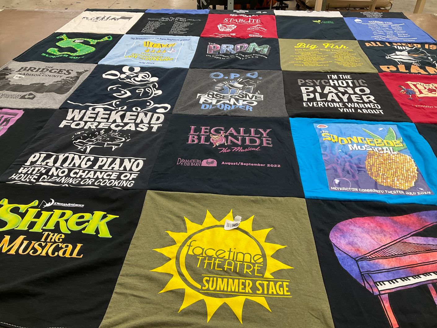 T-shirt quilt with theatre, musicals themes by Laura from PA