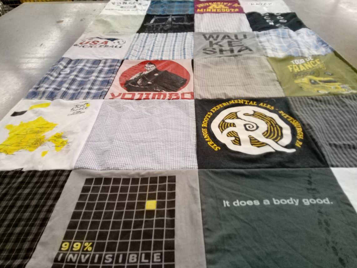 T-shirt quilt with sports, travel themes by Elizabeth from WI