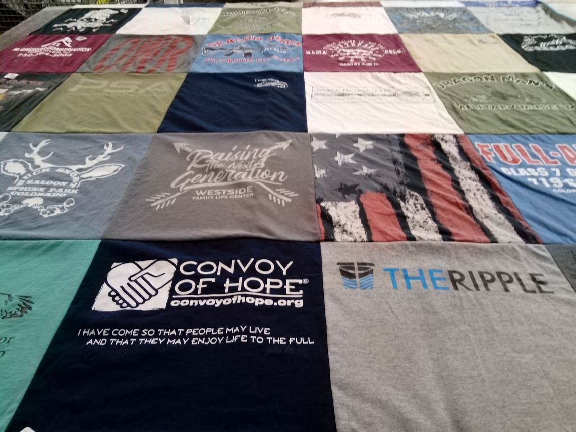 T-shirt quilt with community service, youth programs themes by Martin from CO