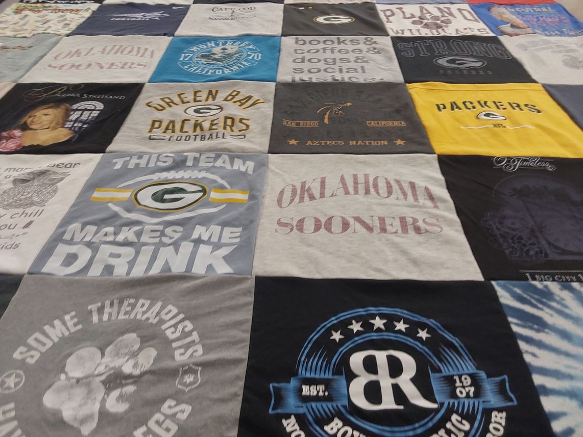 T-shirt quilt featuring green bay packers, oklahoma sooners by Evelyn from CA