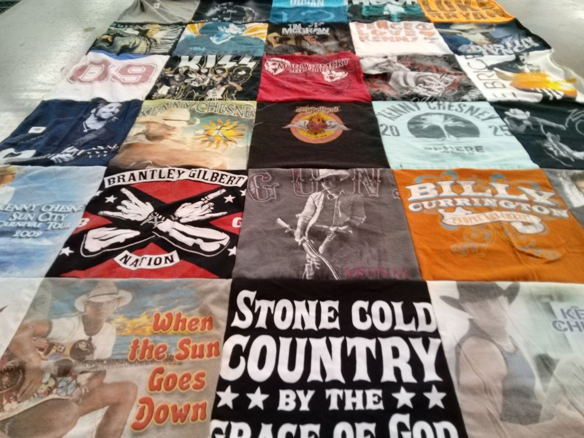 T-shirt quilt with country music themes by Megan from KY