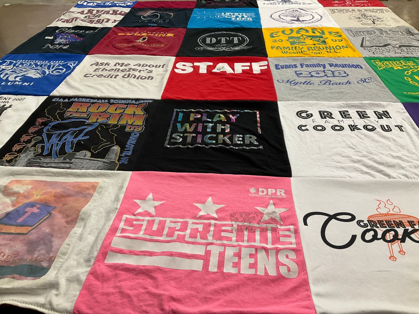 T-shirt quilt with family gatherings, sporting events themes by LaTasha from MD