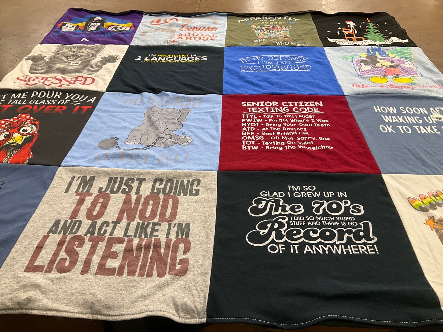 T-shirt quilt with humor, nostalgia themes by Caitlin from MA
