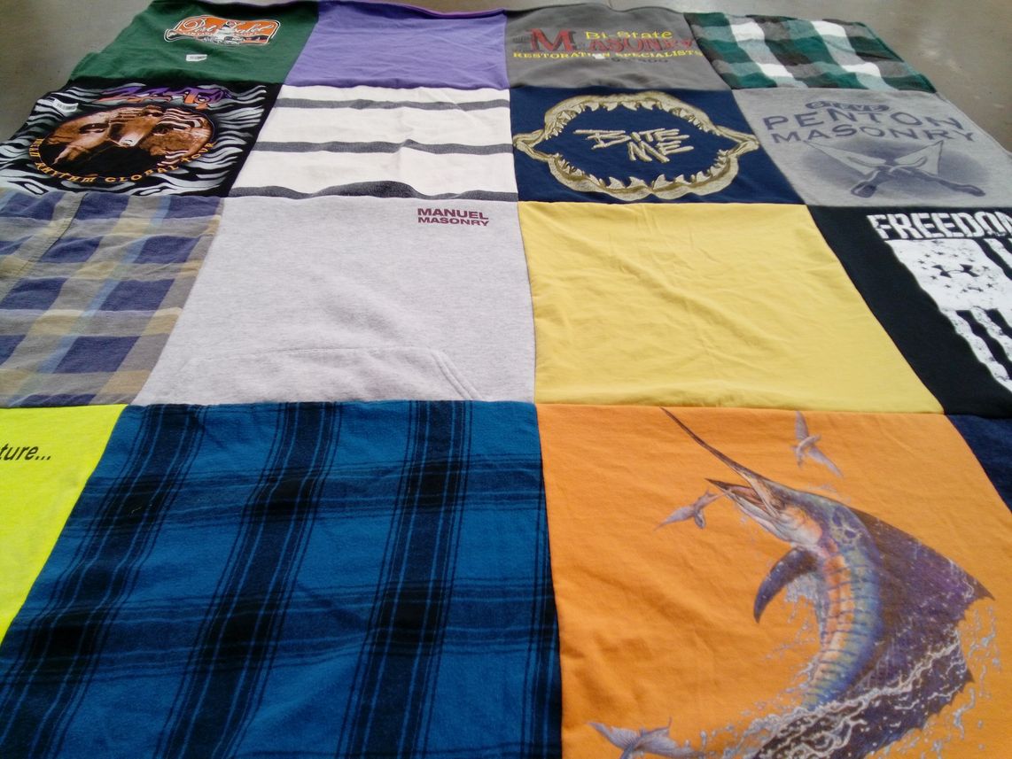 T-shirt quilt with fishing, construction themes by Cathy from IA