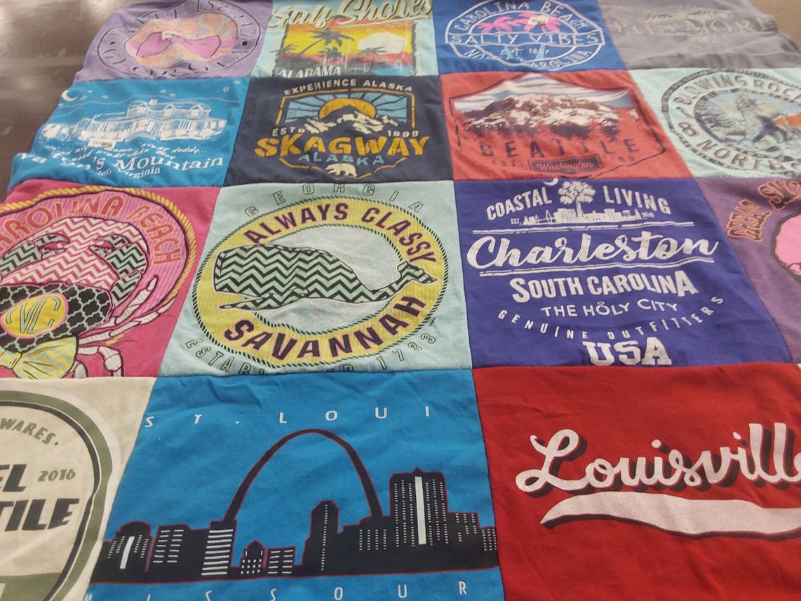 T-shirt quilt with travel, tourism themes by Lori from NC