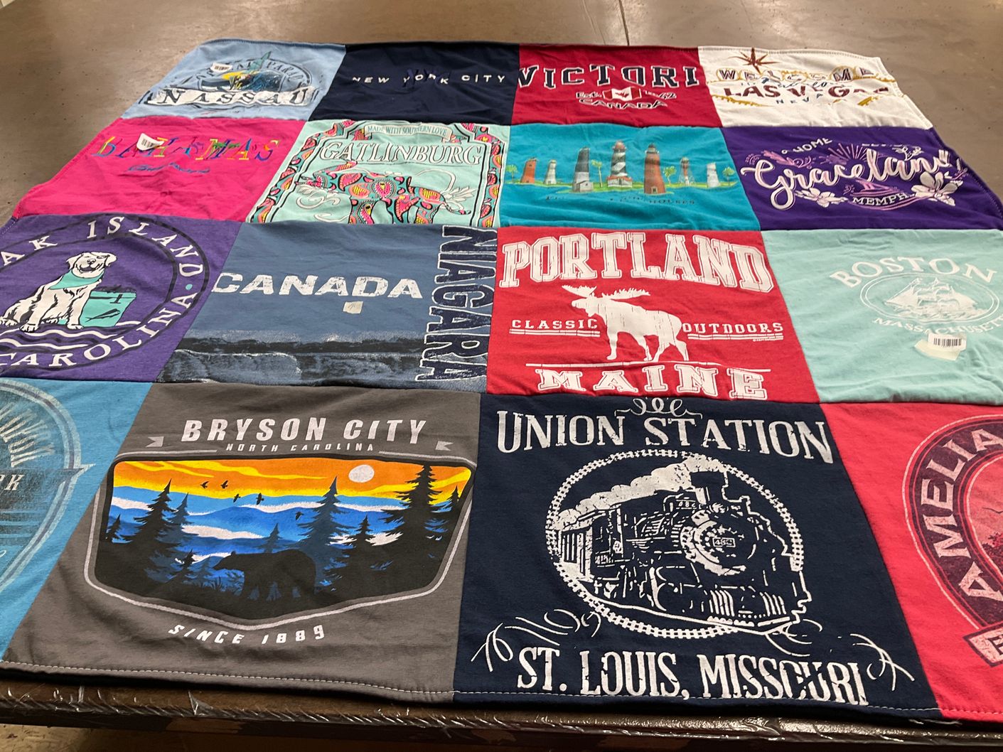 T-shirt quilt with travel, tourism themes by Lori from NC