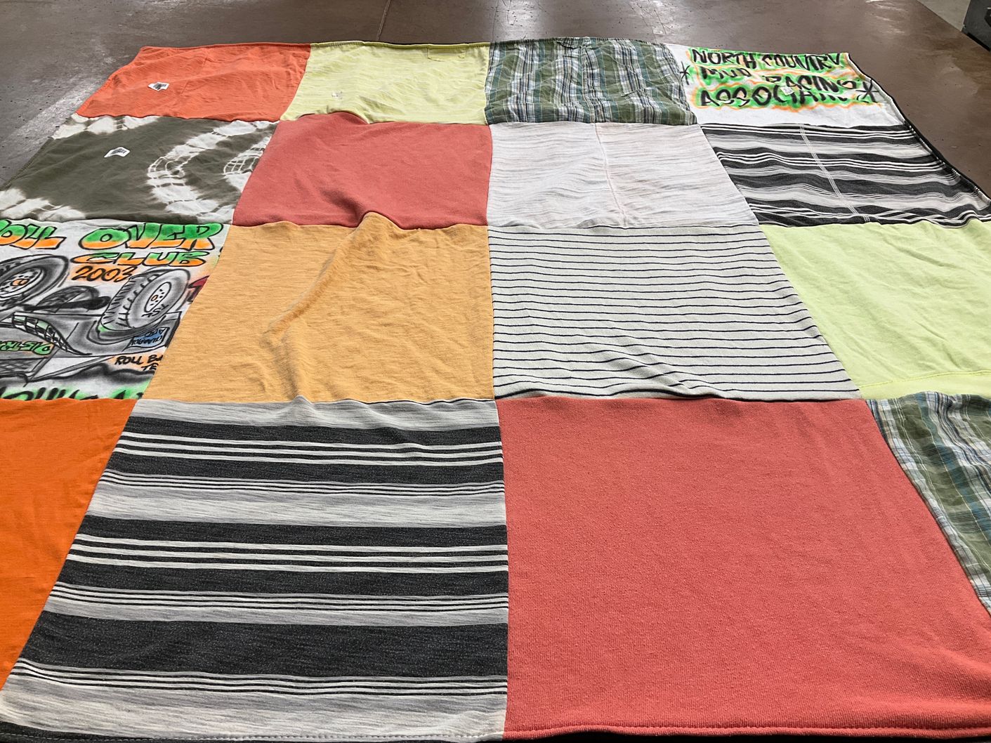 T-shirt quilt with racing themes by Kendra from MN