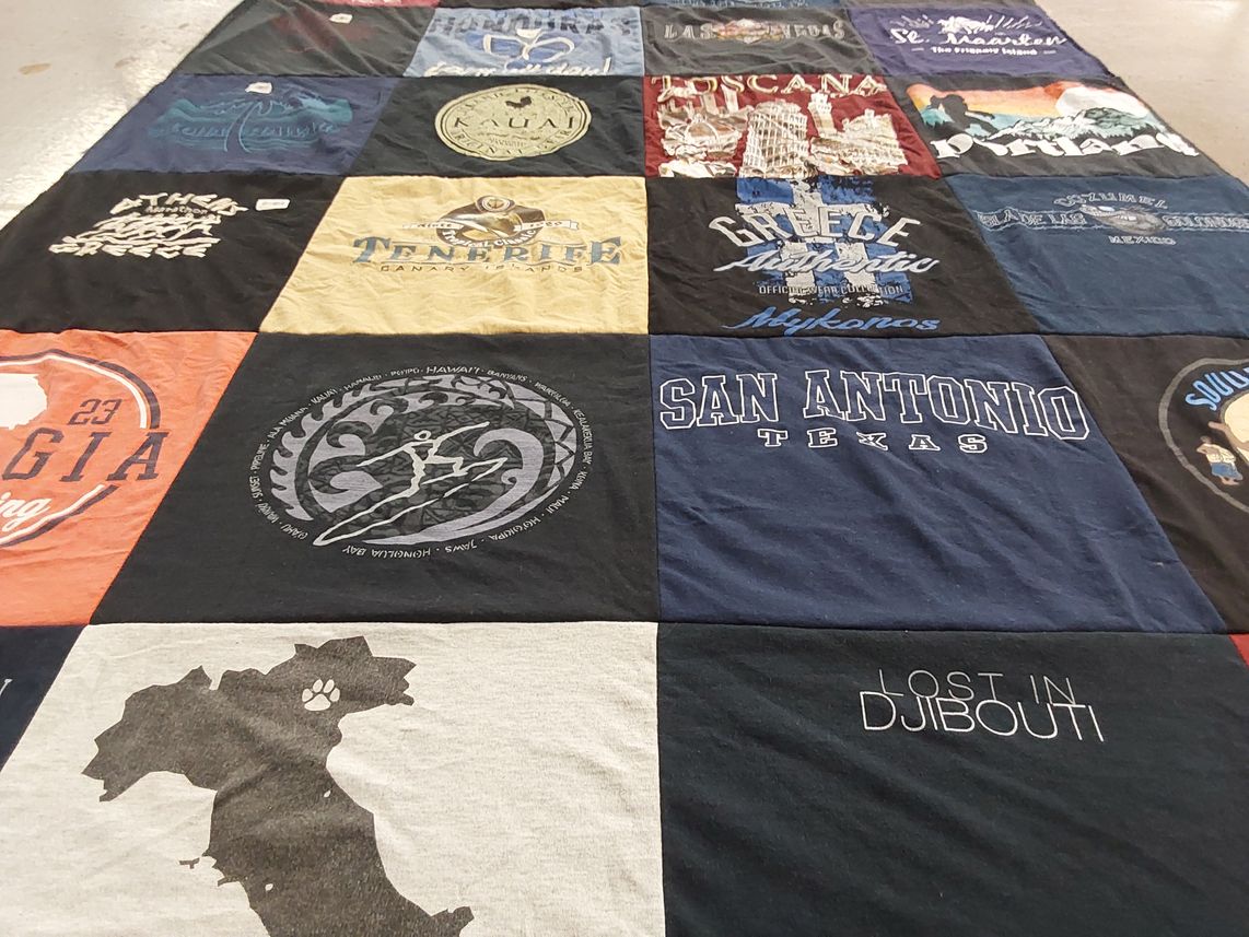T-shirt quilt with travel, geography themes by Sherri from TX