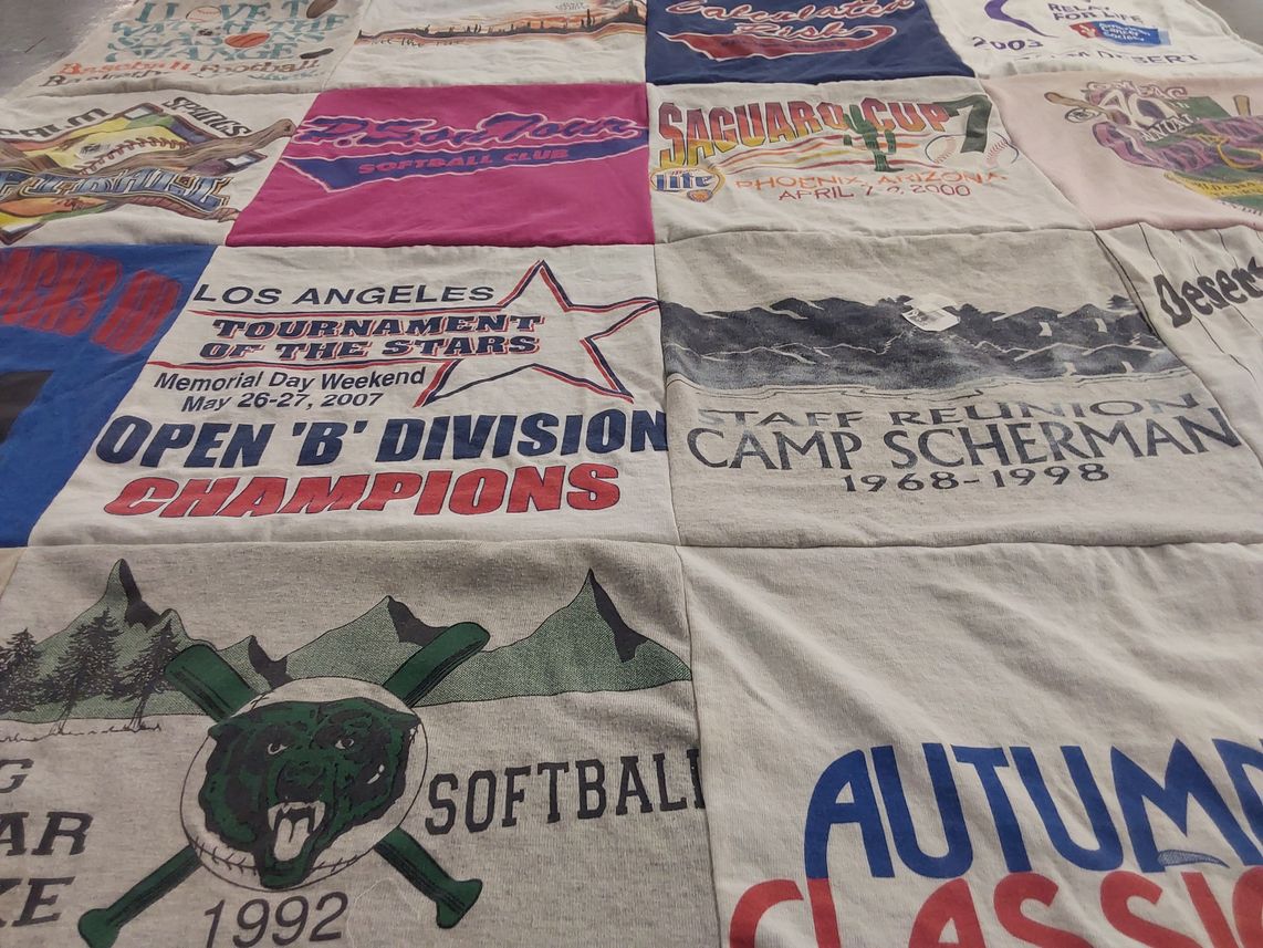 T-shirt quilt with softball, camping themes by Dorlaine from CA