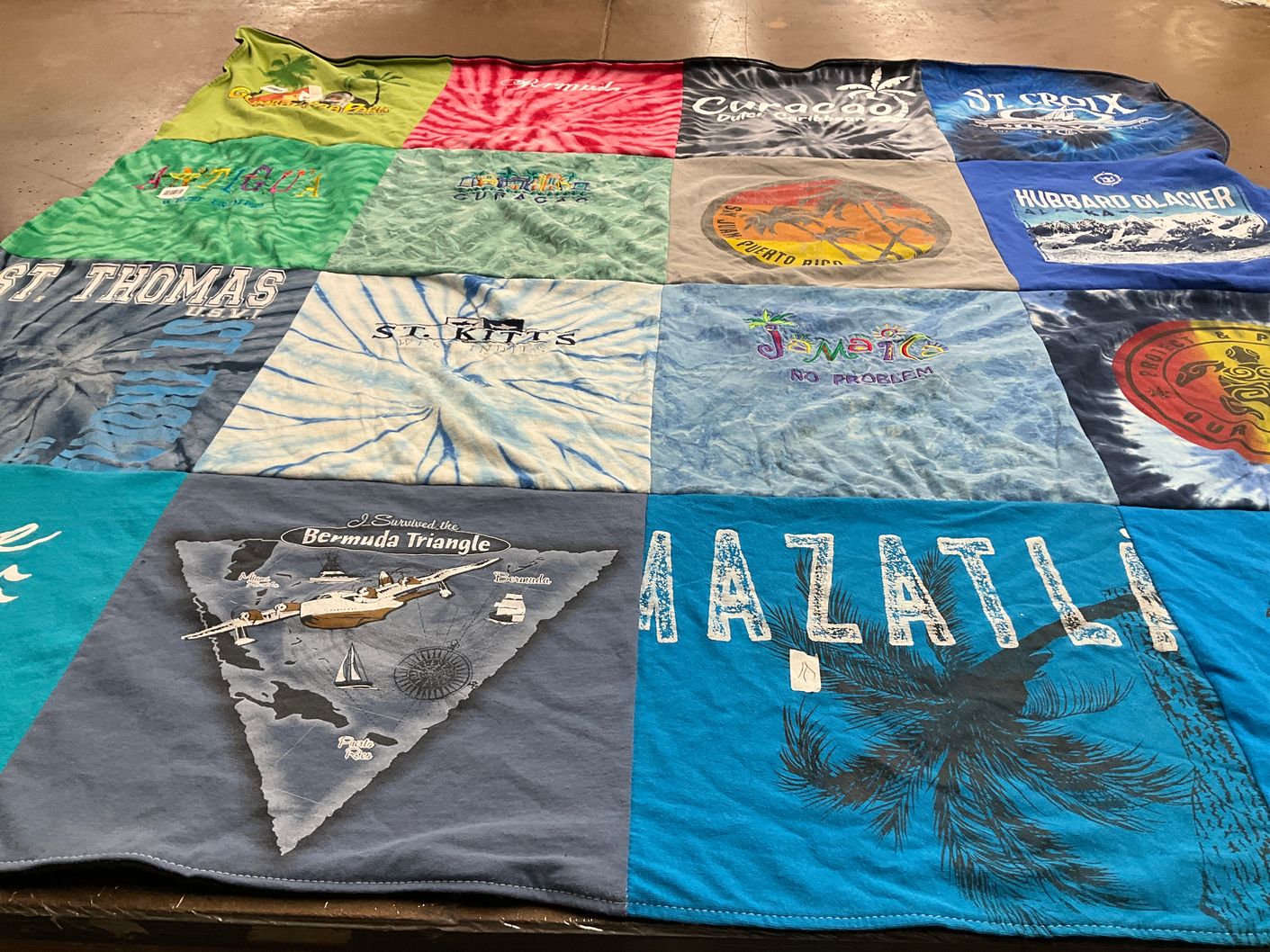 T-shirt quilt with travel, beaches themes by Laura from IL