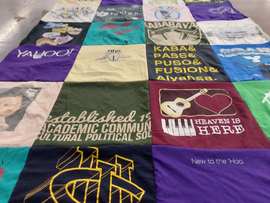 T-shirt quilt with academic, cultural themes by clerlin from CA
