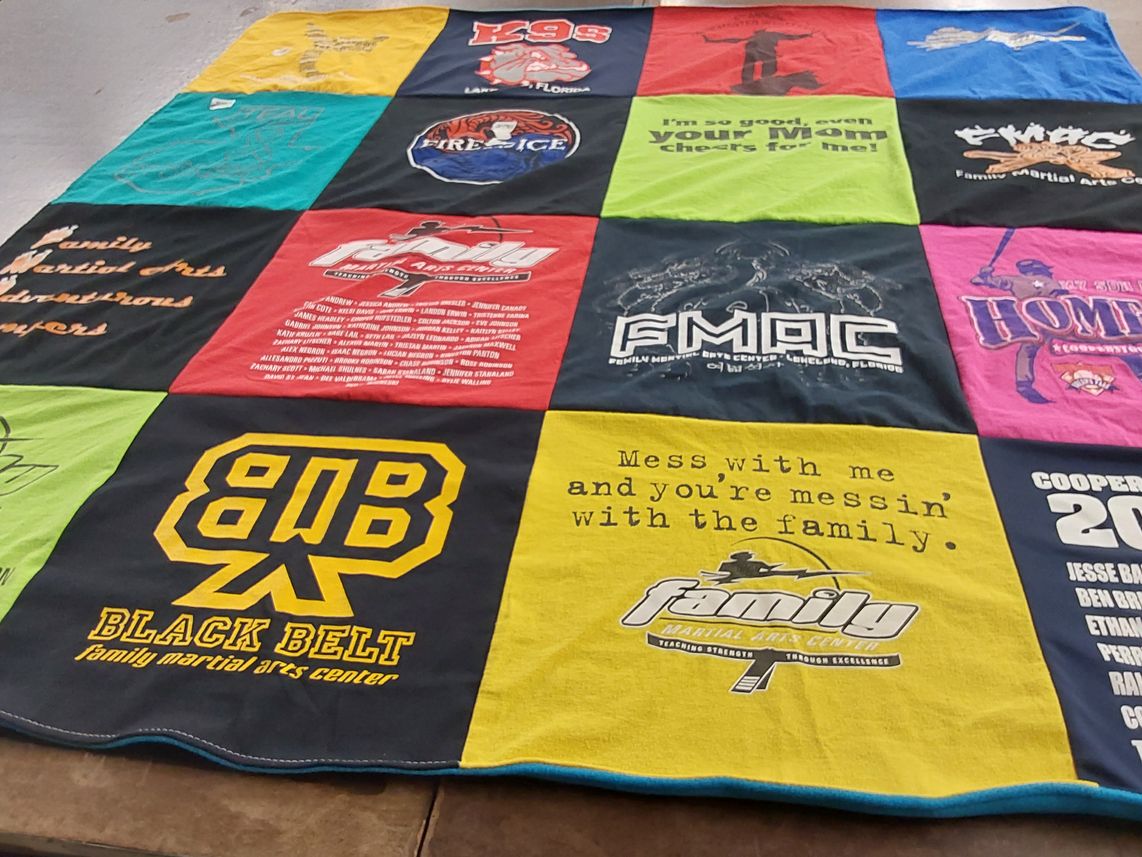T-shirt quilt with martial arts, family activities themes by Jennifer from FL