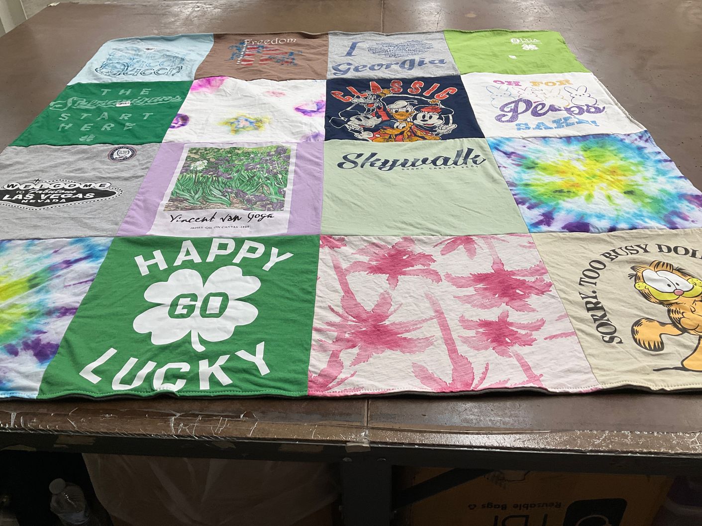 T-shirt quilt with travel, art themes by Beverly from GA