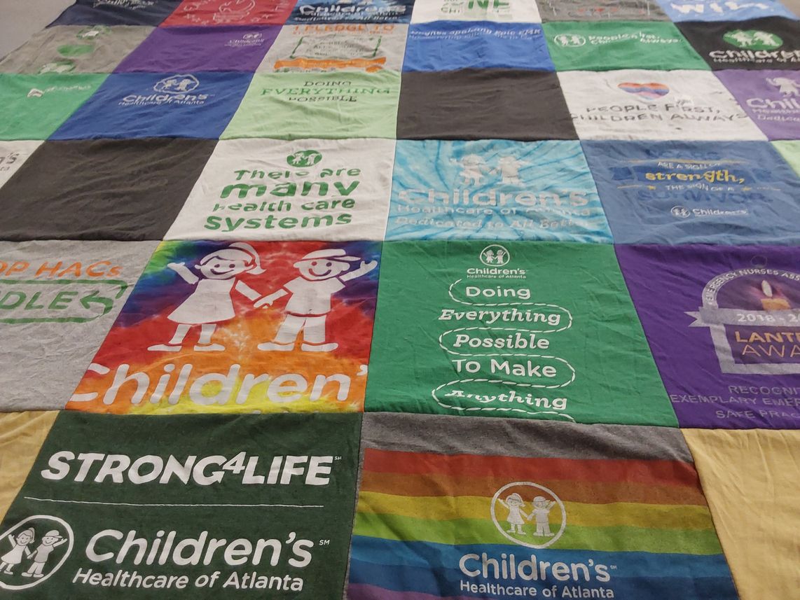 T-shirt quilt with healthcare, children's services themes by Jessica from GA