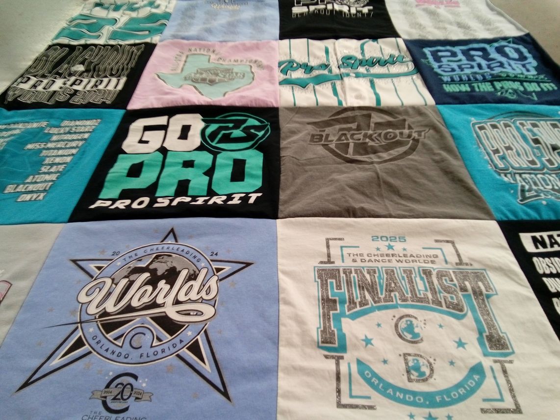 T-shirt quilt with cheerleading, dance themes by Caylie from TX