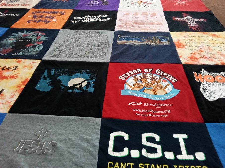 T-shirt quilt with philanthropy, sports themes by Dorothy from CA
