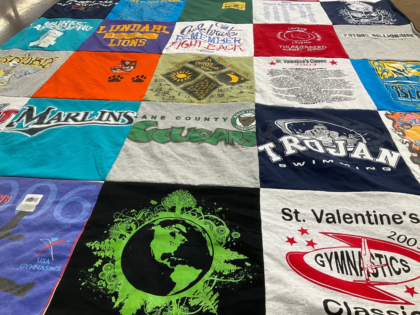 T-shirt quilt featuring trojan swimming, marlins by Eren from IL