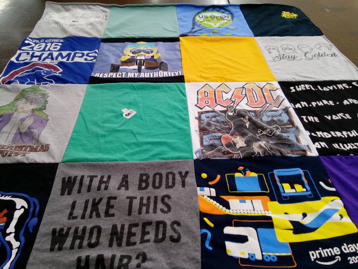 T-shirt quilt with music, tv shows themes by Davis from NC