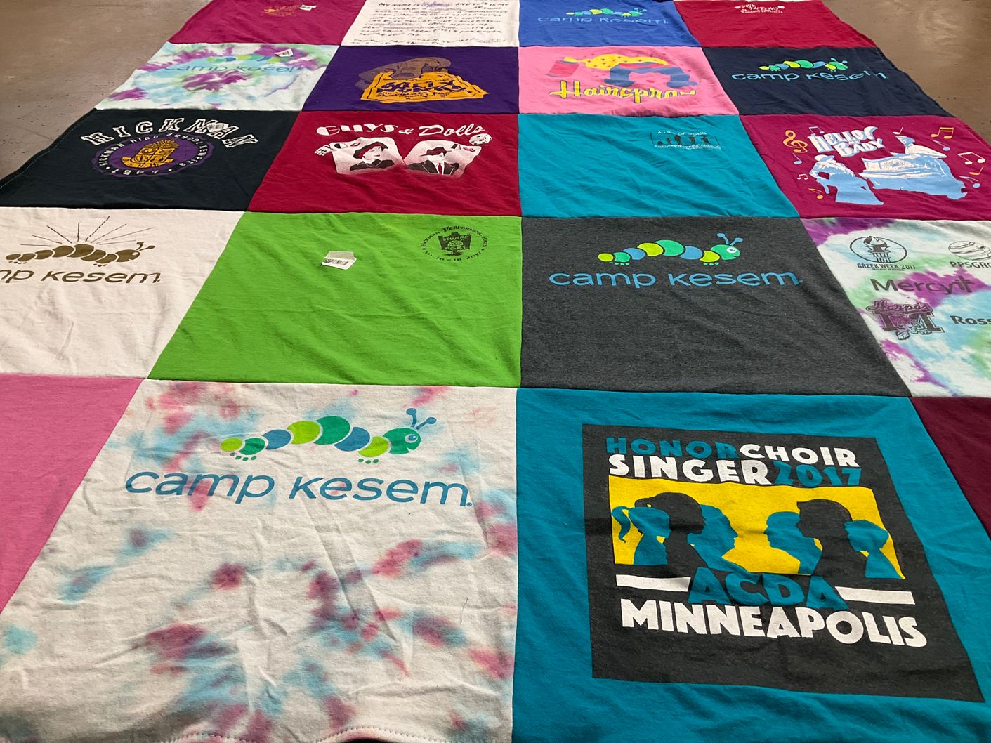 T-shirt quilt with camping, music themes by Susan from MO