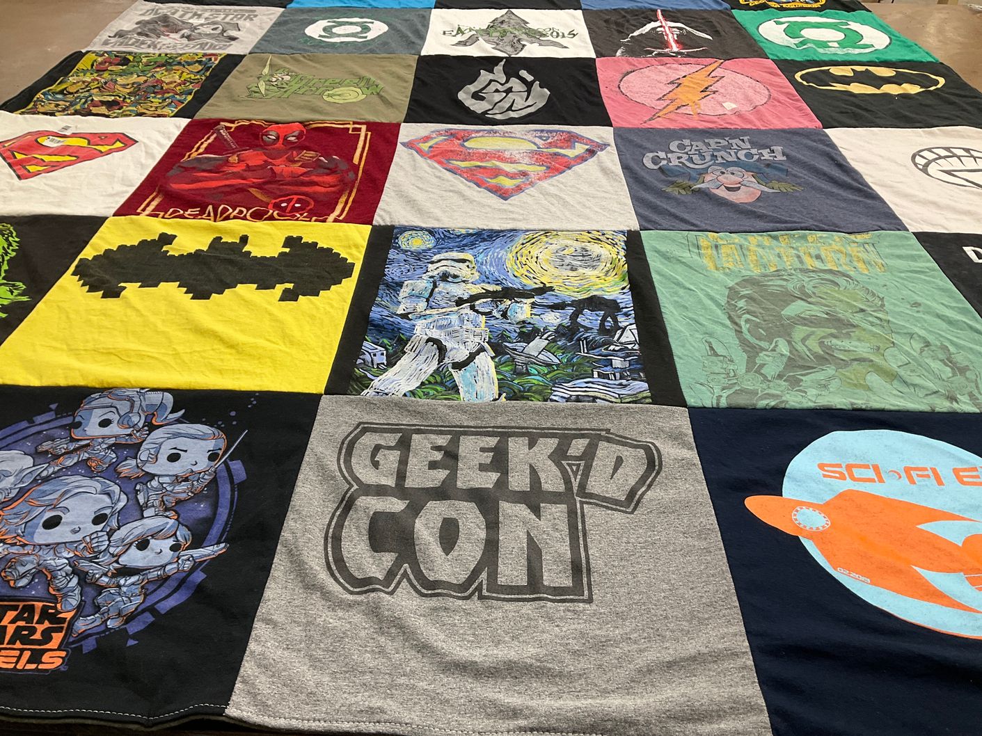 T-shirt quilt with comics, films themes by Bryan from LA