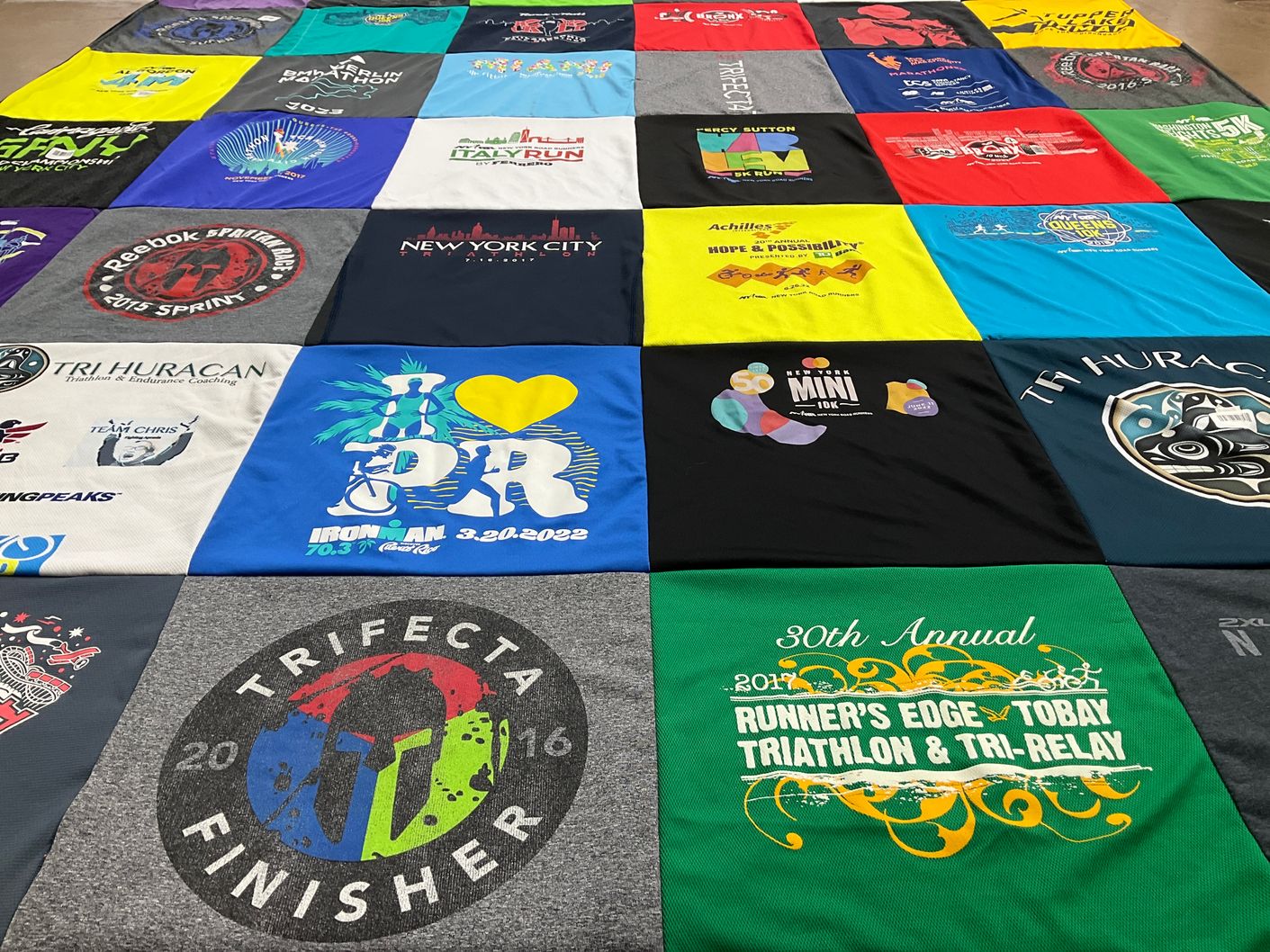 T-shirt quilt with running, triathlon themes by Cari from NY