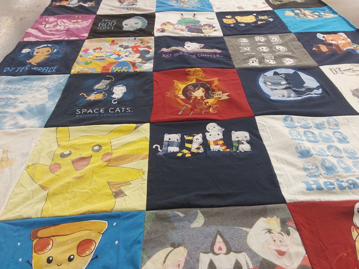 T-shirt quilt with anime, cartoons themes by Kimberly from OK