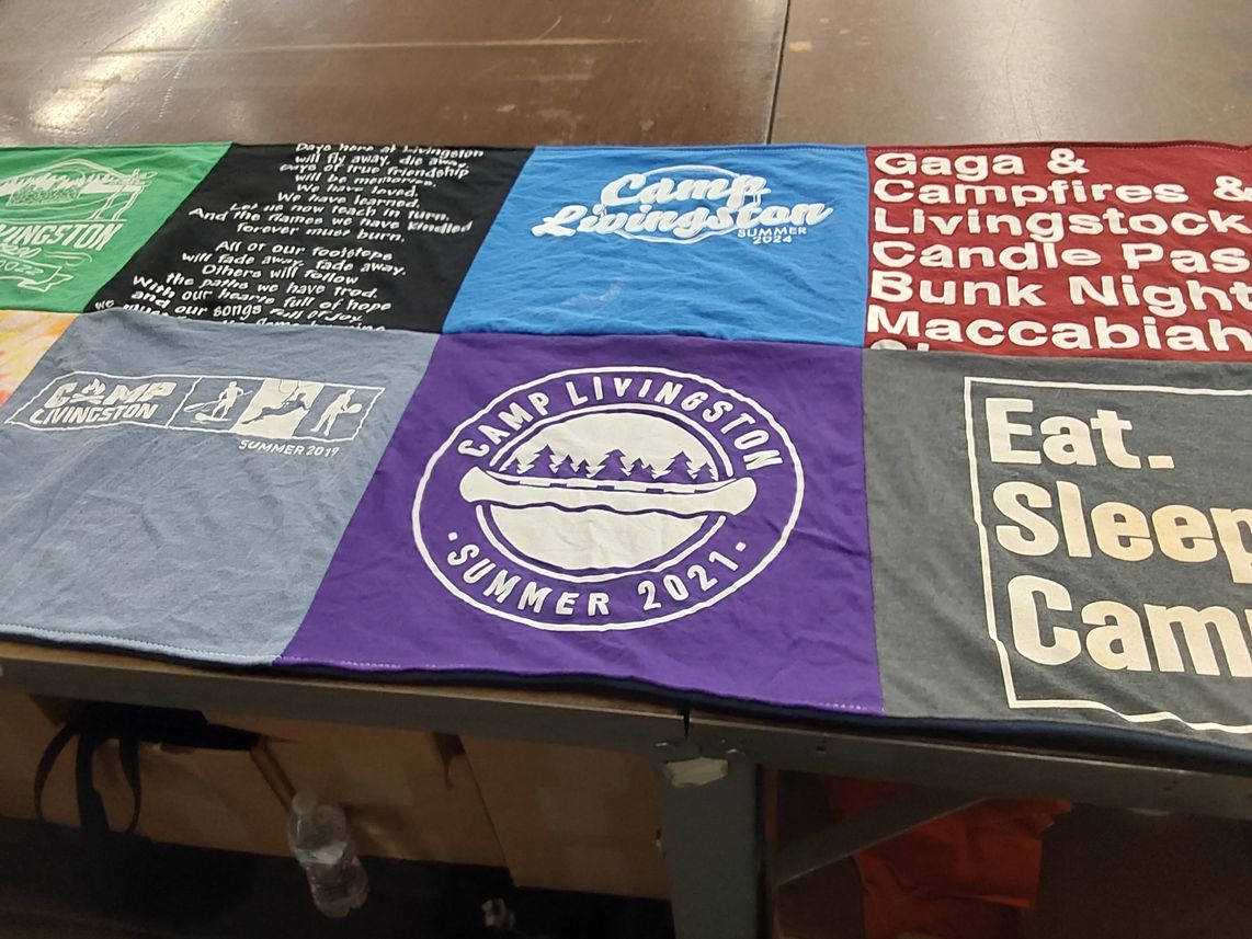 T-shirt quilt with camping, outdoor activities themes by Leah from OH