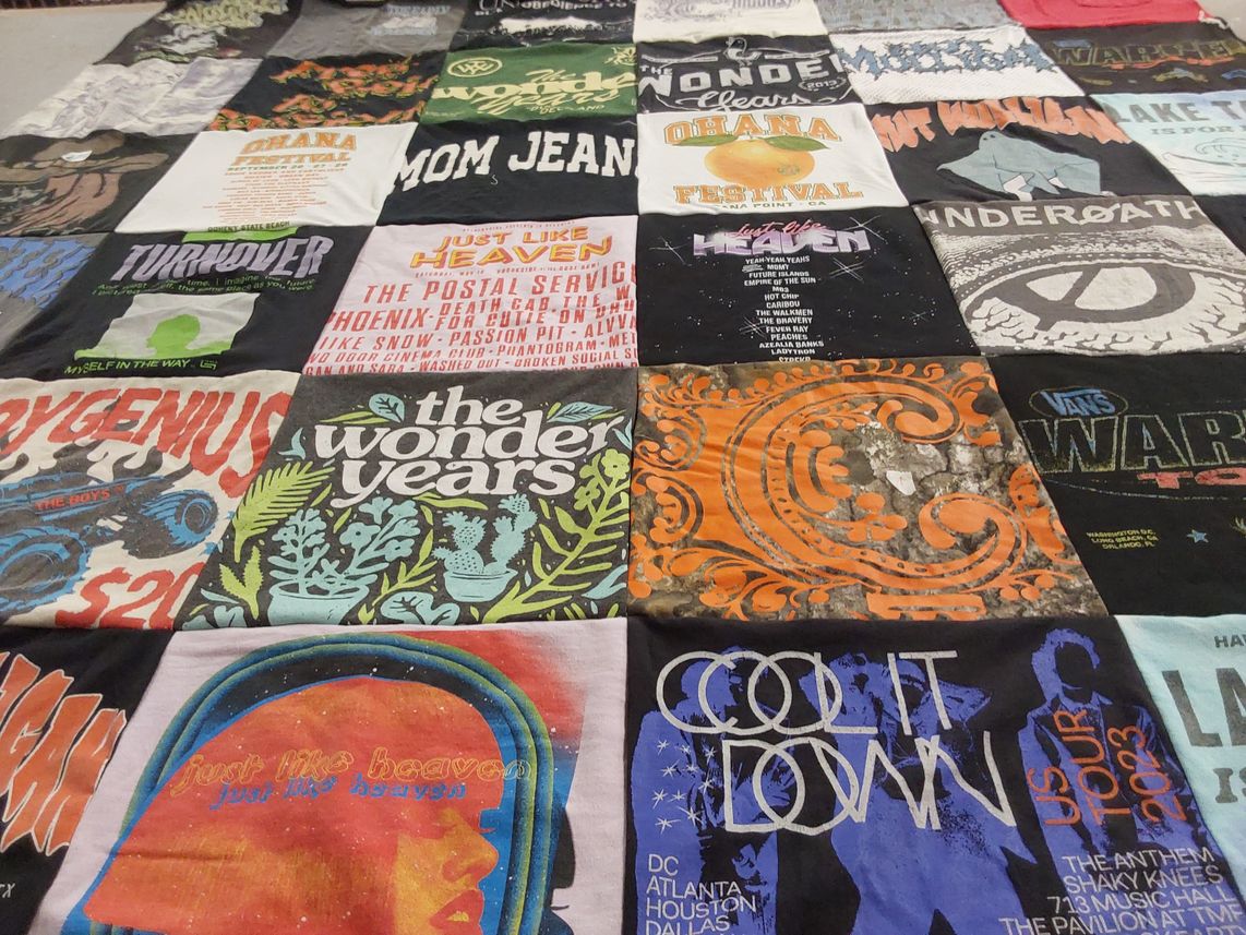 T-shirt quilt with music, concerts themes by Katrina from CA