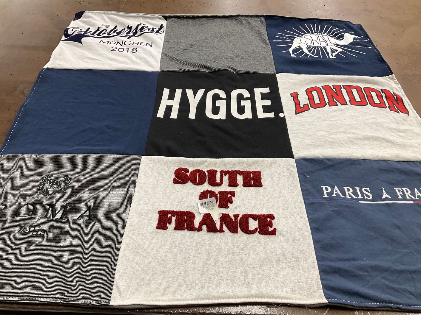 T-shirt quilt with travel, culture themes by Kathryn from TN