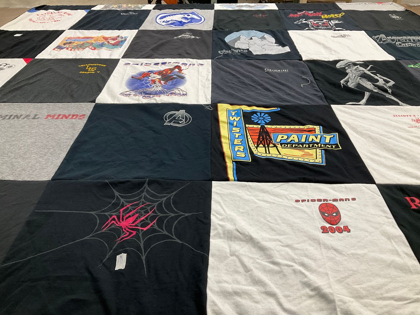 T-shirt quilt with superheroes, movies themes by Susan from CA