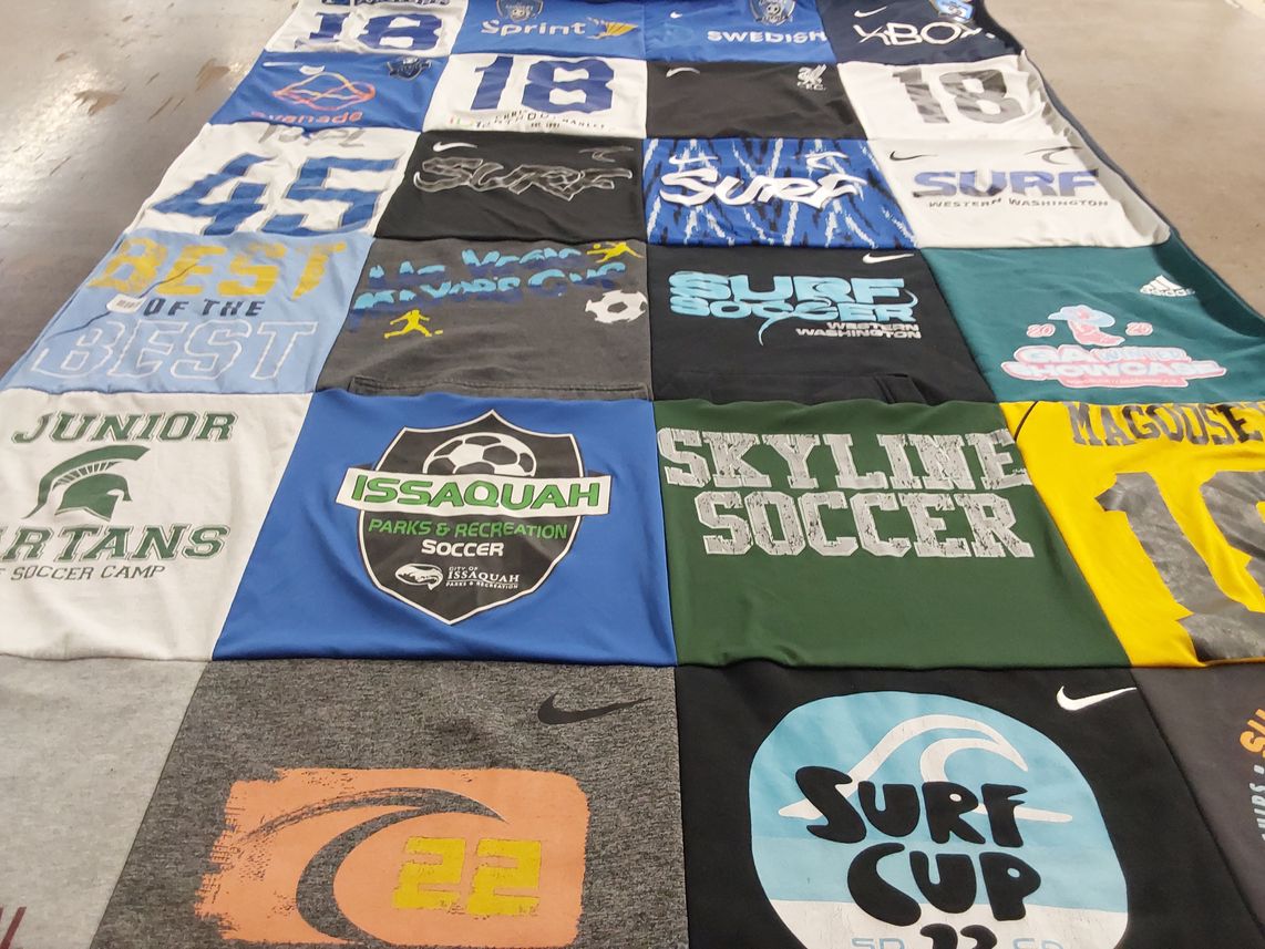 T-shirt quilt featuring issaquah spartans soccer camp, skyline soccer by WEN-CHI from WA
