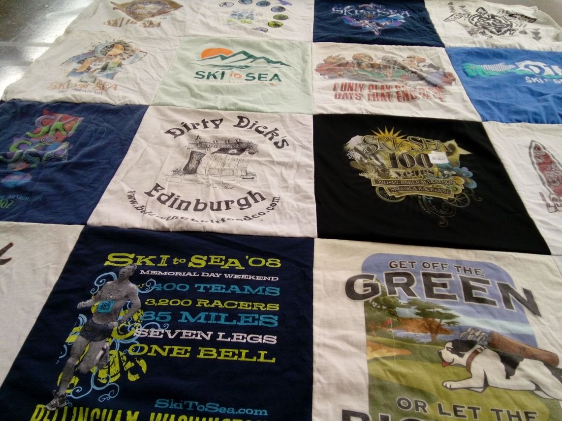 T-shirt quilt with skiing, running themes by Julie from WA