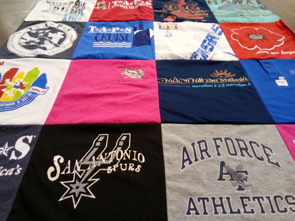 T-shirt quilt with sports, running themes by Laura from TX