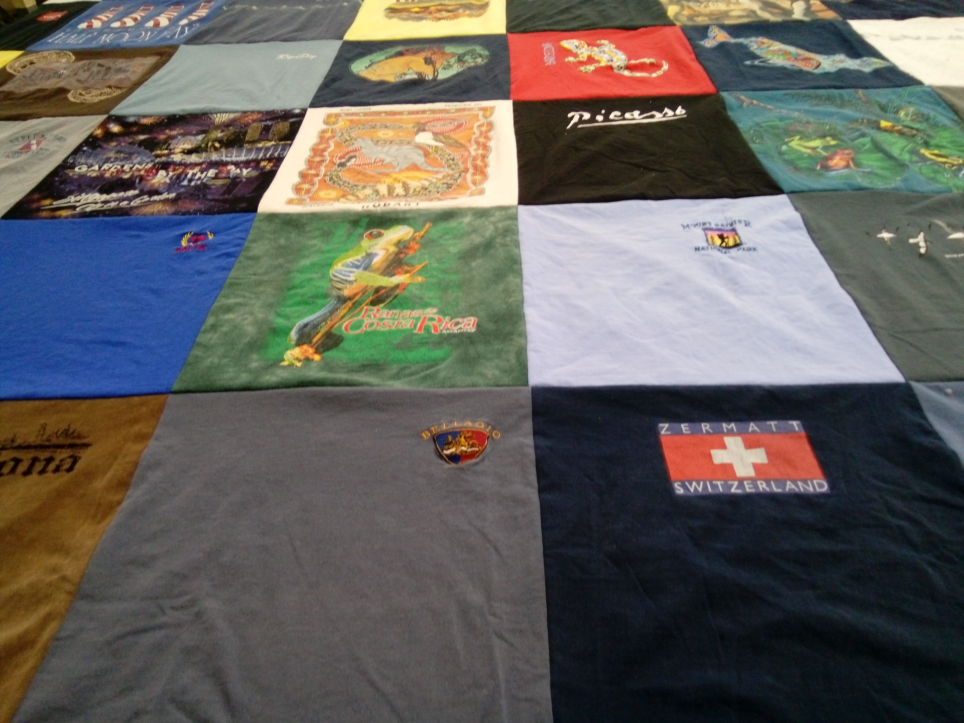 T-shirt quilt with travel, art themes by Antoni from CA