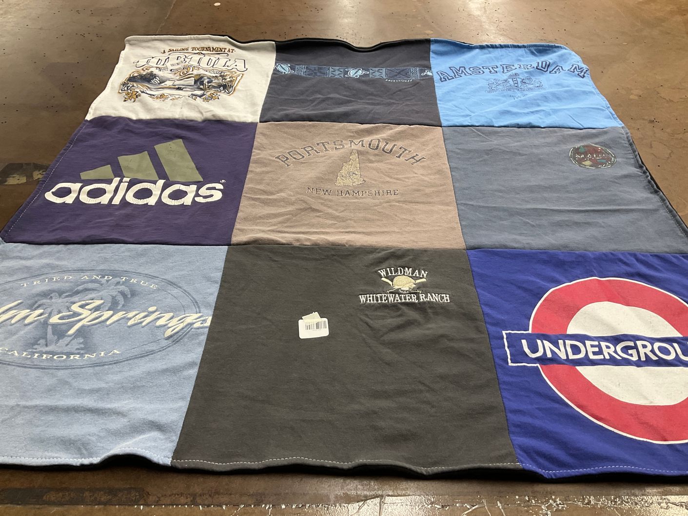 T-shirt quilt with travel, sports themes by Alexandra from IL