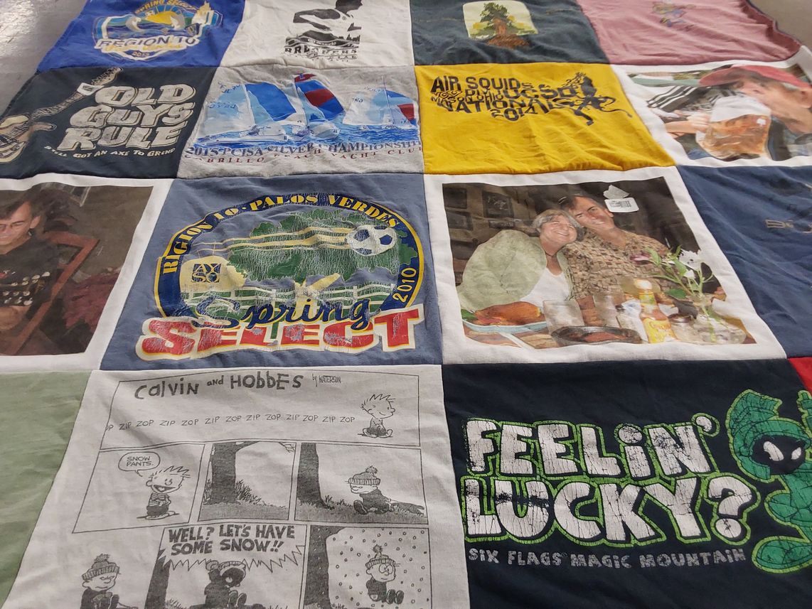 T-shirt quilt with sports, comics themes by Nina from CA