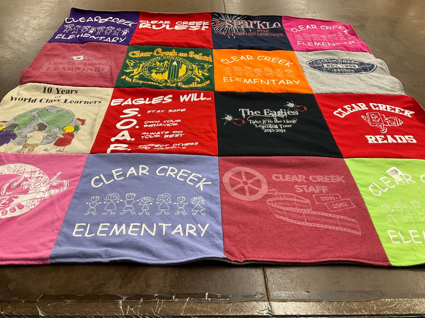 T-shirt quilt from clear creek elementary by Heather from KS