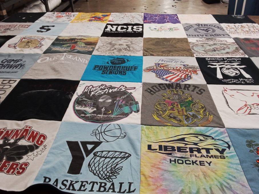T-shirt quilt featuring liberty flames hockey by Katlyn from VA