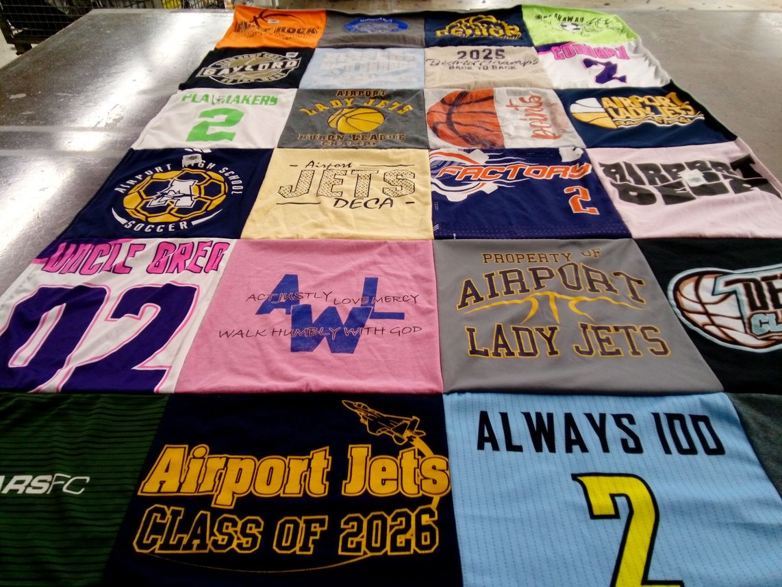 T-shirt quilt featuring airport jets by Dina from MI