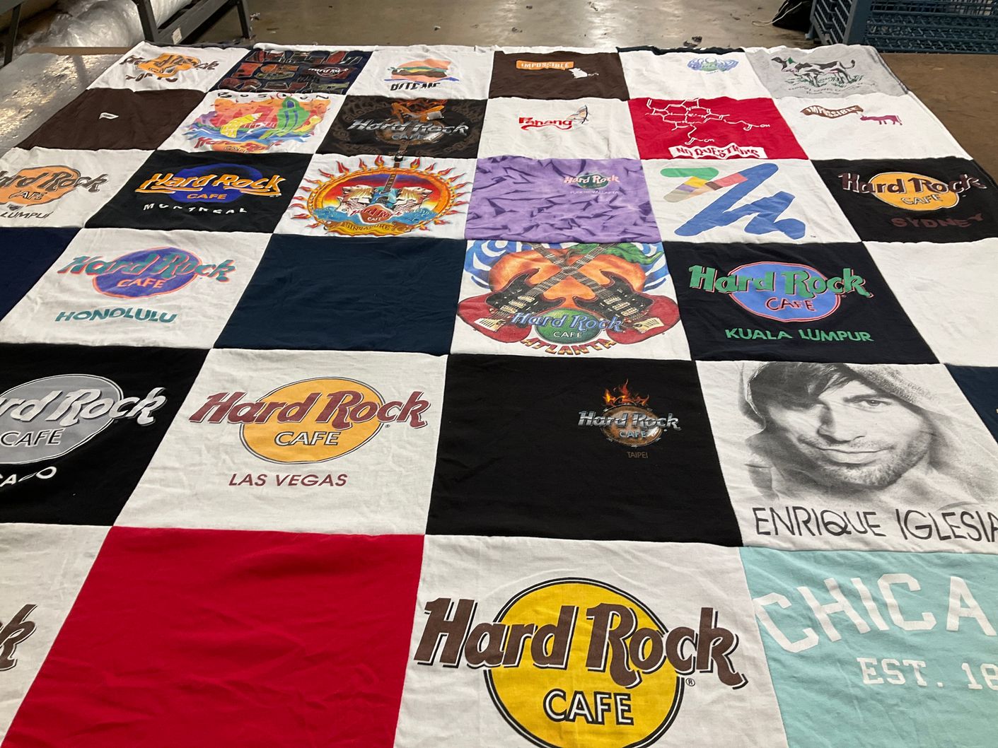 T-shirt quilt with music, restaurants themes by Sally from CA