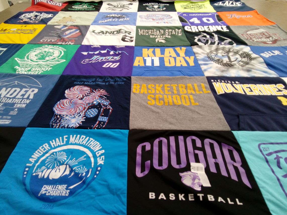 T-shirt quilt featuring wolverines basketball team, cougars basketball team by Sheri from WY