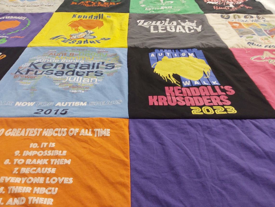 T-shirt quilt with autism awareness, community support themes by Tanyika from GA