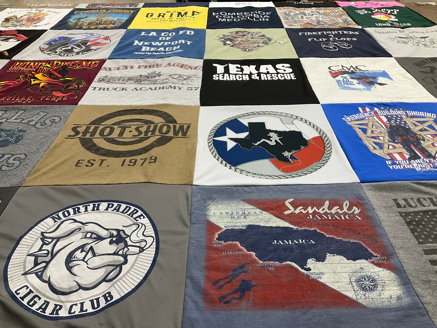 T-shirt quilt with firefighting, cigars themes by Patti from TX