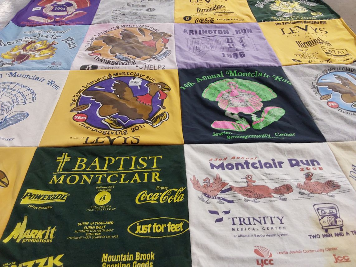 T-shirt quilt with running, community events themes by Goldenberg from CA